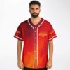 Model wearing fiery geometric-emblem jersey with white piping, front view in studio