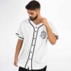 White geometric icosahedron jersey with chest emblem and black piping, angled front view on model