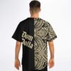 Model back view highlights the split black-and-cream Polynesian-inspired geometric pattern