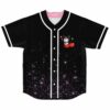 Cartoon-style cherry character and purple starfield pattern on black jersey, front view with white piping