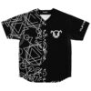 Front-view black jersey with scattered white geometric circles and triangles, button closure and chest emblem
