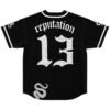 Black Old English rave jersey back view with “reputation,” newspaper-text 32, and patterned snakes