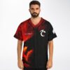 Dark dragon jersey worn front view, showing fiery artwork, black trim, and white chest emblem