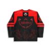Red demon mask with hand-sign graphics and stylized lettering, back view for festival wear