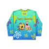 Cartoon-style sea friends on an aqua blue flower-pattern jersey, back view with “Festy Bestie” text