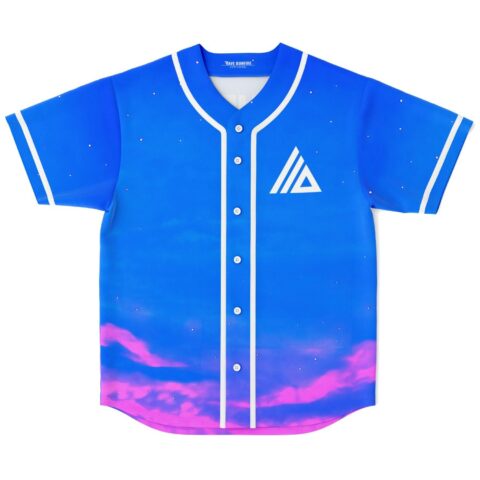 Royal blue geometric emblem jersey front with white piping, buttons, stars, and purple-pink cloud border