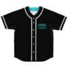 Graffiti-style black jersey front with turquoise DYNAMASH lettering and white piping against a clean background