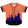 Orange Halloween cityscape jersey with bats, glowing windows, and shadowy cats, front view