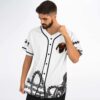 Model front view displaying an aged skull chest graphic, black piping, and chain print