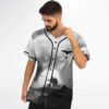 Grayscale cosmic mountain landscape jersey, black button piping and winged emblem, front view on model