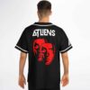 Black festival jersey with red dual-mask graphic and geometric lettering, modeled back view in studio