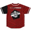 Red-and-black op-art reversible jersey side with radiating stripes and central cartoon-style graphic