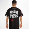 Black jersey back with red electric lightning pattern and bold “HENNY HOAN” lettering, modeled