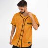 Orange marbled swirl jersey with black trim and button placket, modeled front view