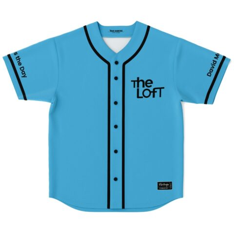 Sky blue jersey featuring black piping and “The Loft” text, front view on white background