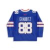 Royal blue line-art jersey back with oversized white 88 lettering and red-trimmed sleeve stripes