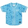 Light sky blue paint splatter jersey front with “KING” chest lettering, front view