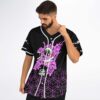Model wearing pink melting cartoon creature design and purple cube pattern, front three-quarter view