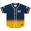 Cartoon-style navy-to-gold gradient jersey with wavy “AB” chest lettering, front flat lay