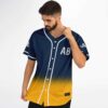 Wavy “AB” chest lettering on navy-to-gold gradient jersey, styled front view on model