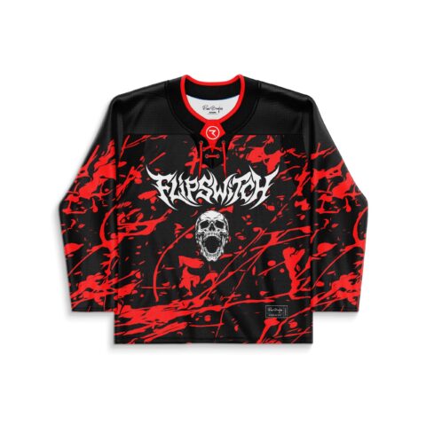 Black rave hockey jersey, screaming skull/red splatter design, red laced collar, front view