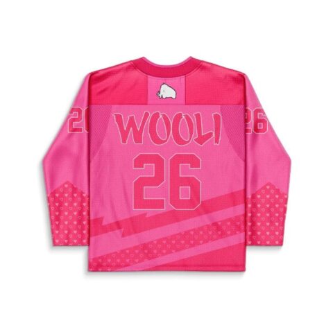 Hot pink outlined lettering and number 26 with elephant patch, heart-patterned back view