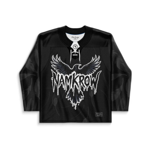 Black spread-wing eagle design with dripping NAMKROW lettering on a rave hockey jersey, front view