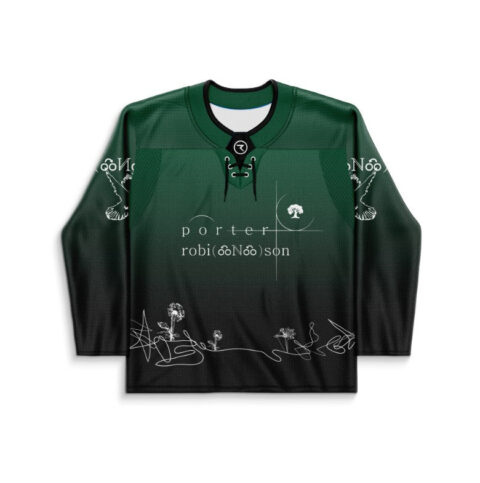 Forest green lace-up jersey front with delicate white flowers and abstract signatures, shown against white