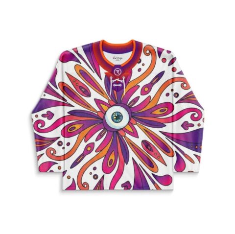 Kaleidoscopic floral swirl jersey with central eye motif, front view on white background