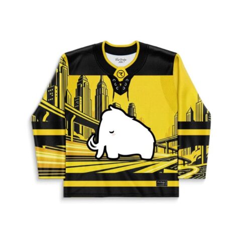 Cartoon-style yellow-and-black cityscape jersey front with a large white mammoth graphic and striped sleeves
