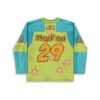 Turquoise and lime green floral pattern with cartoon back graphic, orange 29 and readable lettering