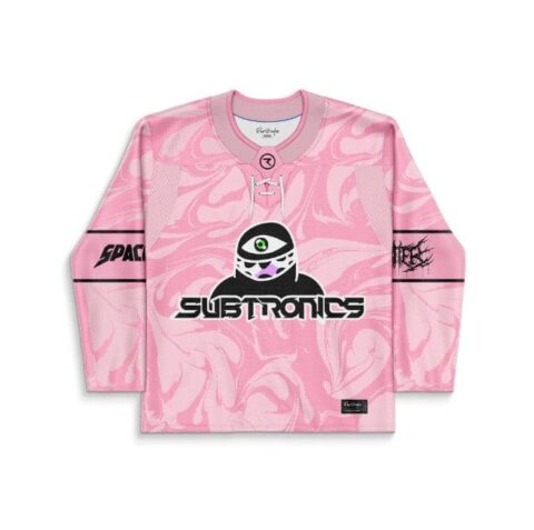 Pink abstract swirl hockey jersey front with one-eyed cartoon-style mascot and bold festival lettering
