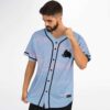 Pastel cloud print jersey front view on model with black piping, buttons, and animal silhouette
