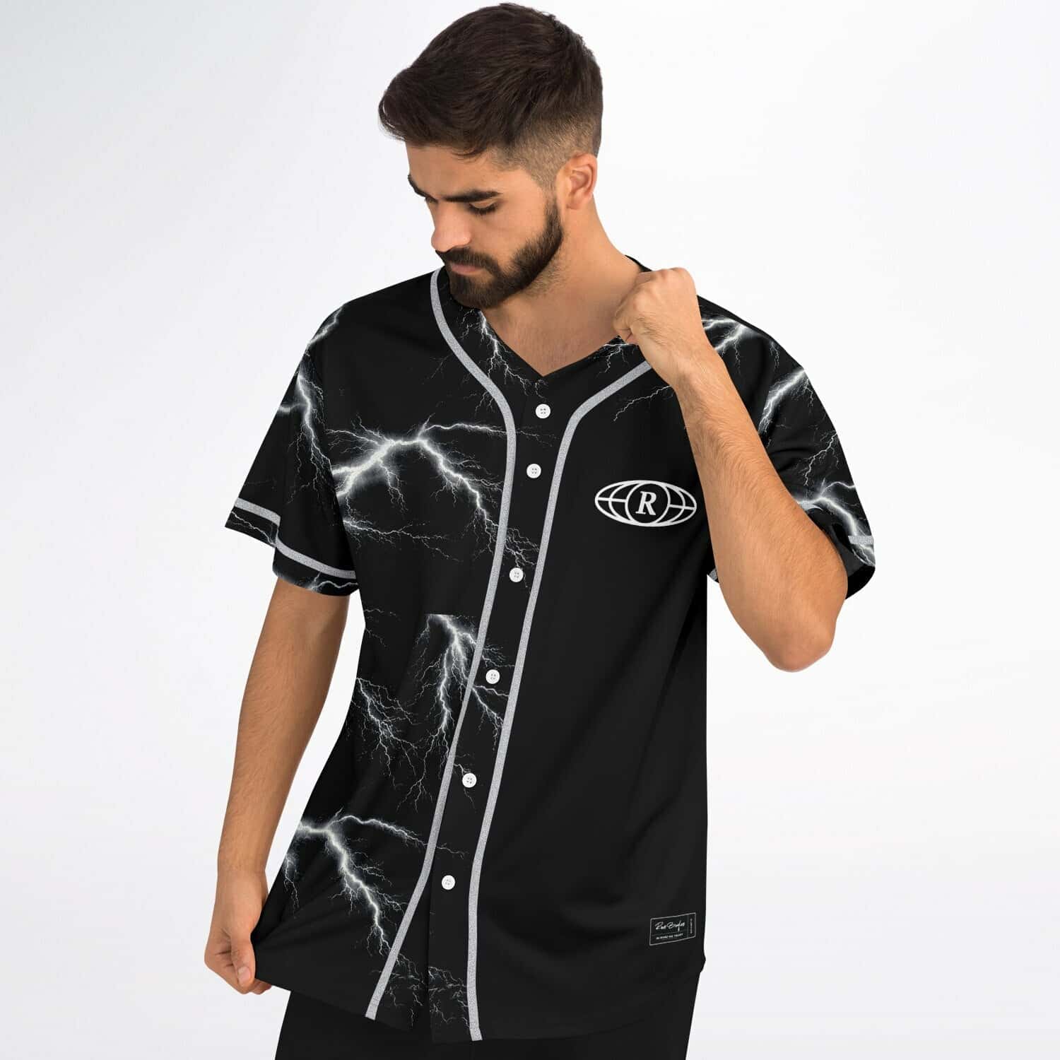 Model wearing electric lightning-pattern jersey front view with silver trim and buttons in studio