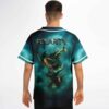 Model wearing back of teal smoky cloud jersey with horned fantasy figure and “POLARITY.” text