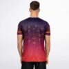 Model wearing the Armin van Buuren fan rave soccer jersey, back view, showing the gold circle design on the purple sunset gradient