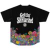 Back view, black psychedelic floral print with smiley faces, mushrooms, and “Gettin’ SHHlarched” lettering
