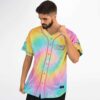 Pastel rainbow spiral tie-dye jersey with pink trim, shown in a modeled three-quarter front view