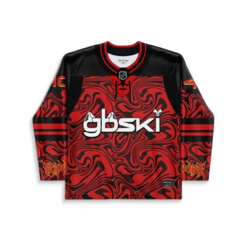 Red-black abstract swirl jersey front with bold white lettering and striped sleeves, studio view