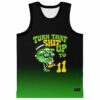 Cartoon cannabis character in sunglasses with "TURN THAT SHIT UP TO 11" on black-green front