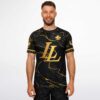 Model wearing black rave soccer jersey with gold accents, model view