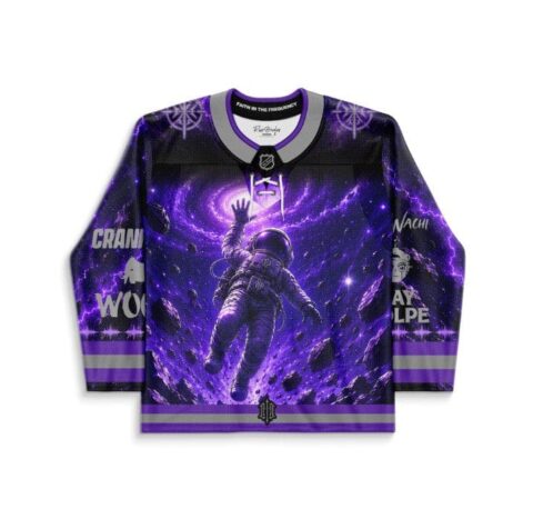 Purple cosmic astronaut jersey with lightning and floating rocks, front view on white background