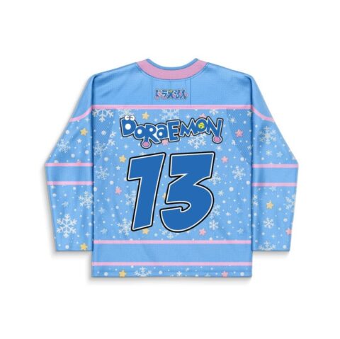 Blue snowflake-pattern jersey with pastel stars, pink trim, and bold number 13, back view