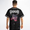 Black starry night jersey back displays jagged lettering and purple creature on a model