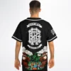 Model wearing the cartoon bear baseball jersey from behind, showing full back graphic and sleeve lettering