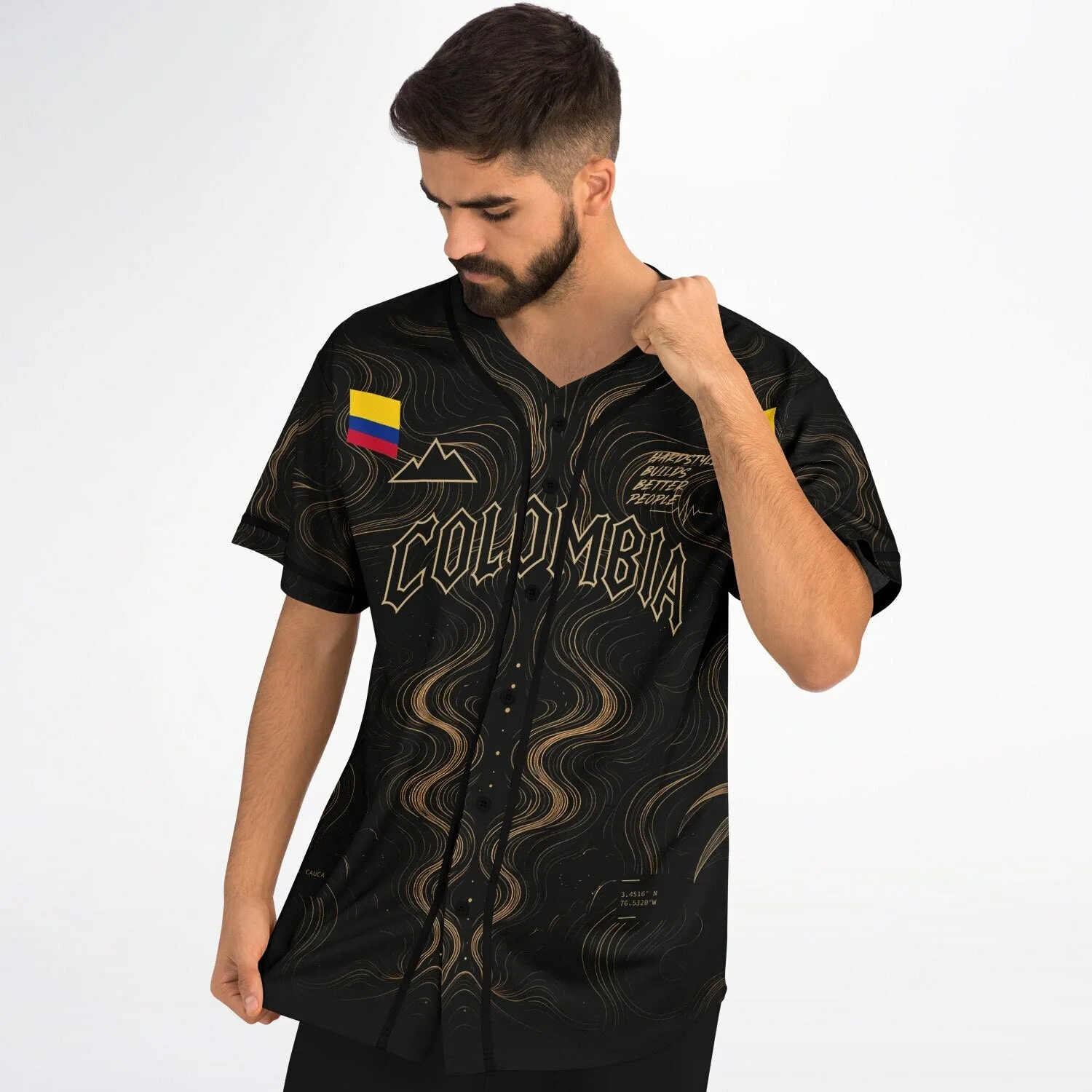Close-up of Colombia flag sleeve patches and gold swirl pattern on the jersey