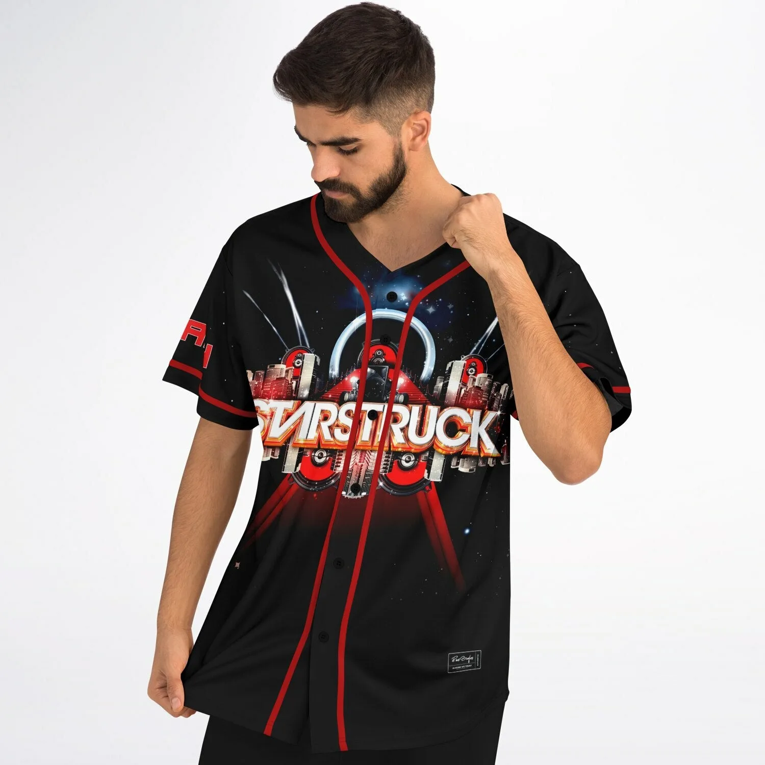 Close-up of red piping and starfield print detail on custom baseball jersey