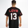 Model wearing black galaxy print baseball jersey with LOVE 13 back design and red piping