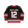 Back view of black custom rave hockey jersey with red stripes, custom name and number print, and gold sleeve text