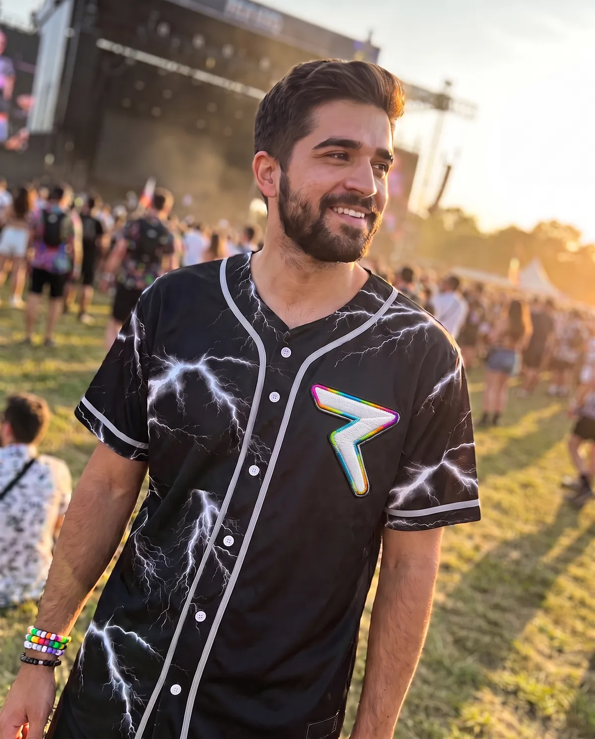 Sublimation vs embroidery on one jersey: a printed rave baseball jersey with a small embroidered Rave Bonfire crest on the chest